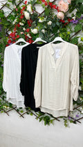 Blusa Cuello V